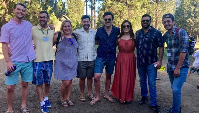 Young alumni board members smiling