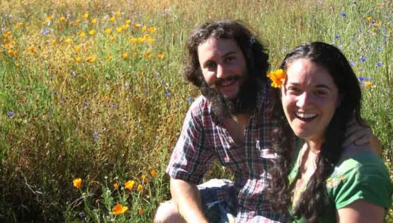 Joe and Jen Boxerman in a field